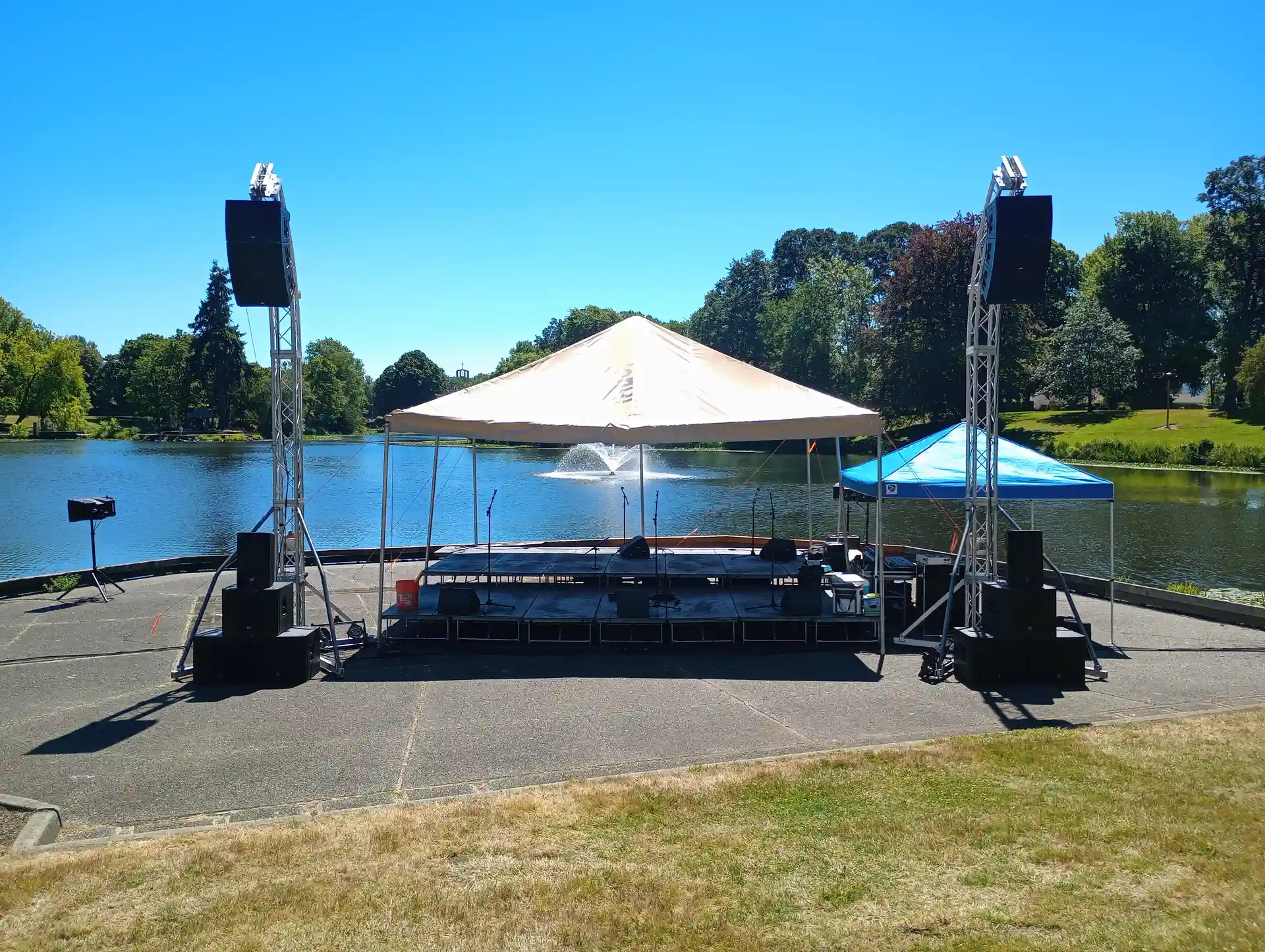 Outdoor festival stage with line array speakers